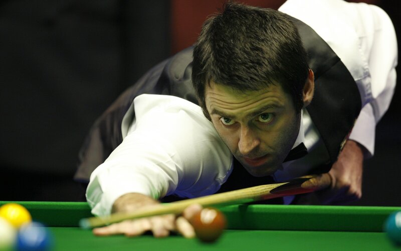 snooker player taking shot