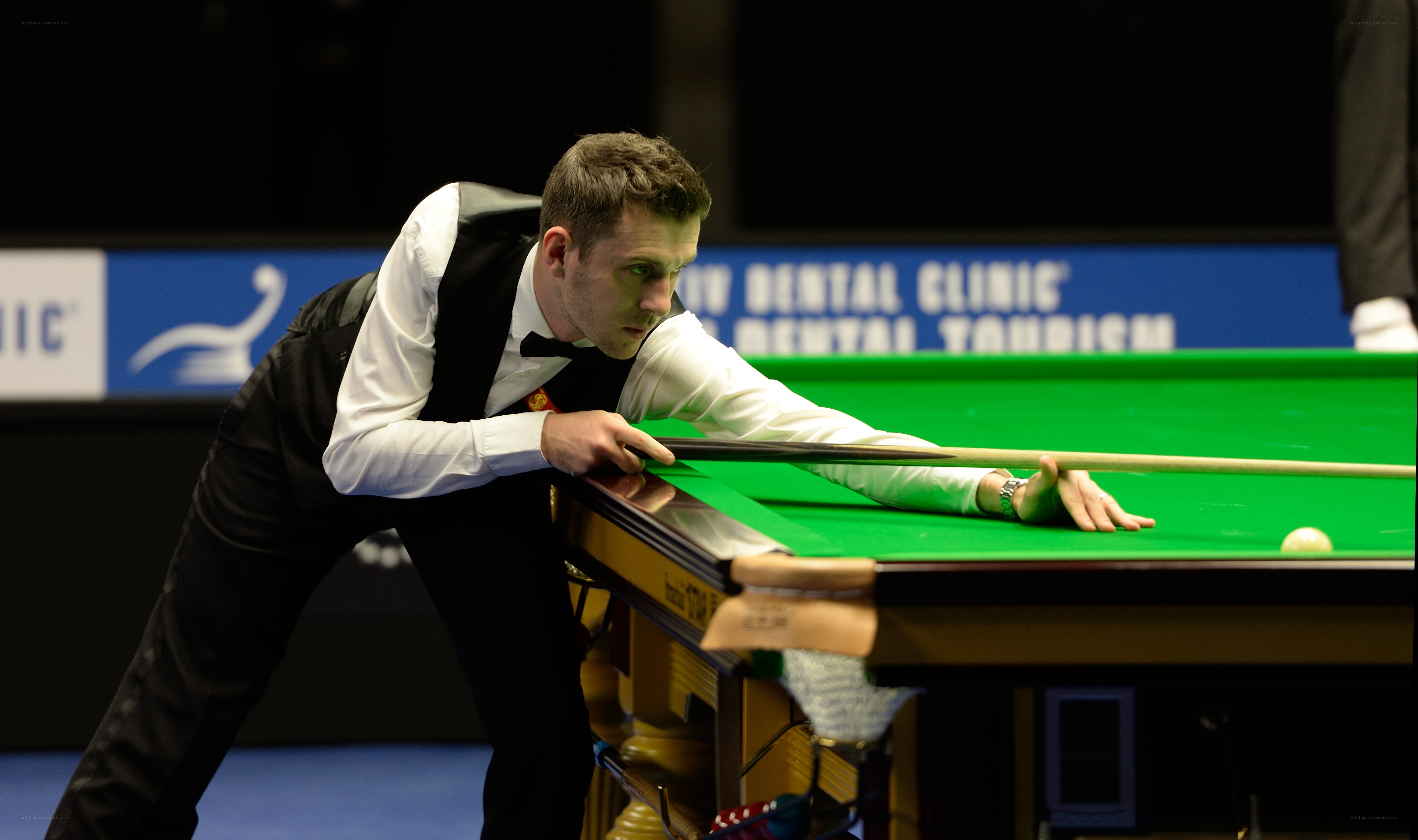 snooker player taking shot