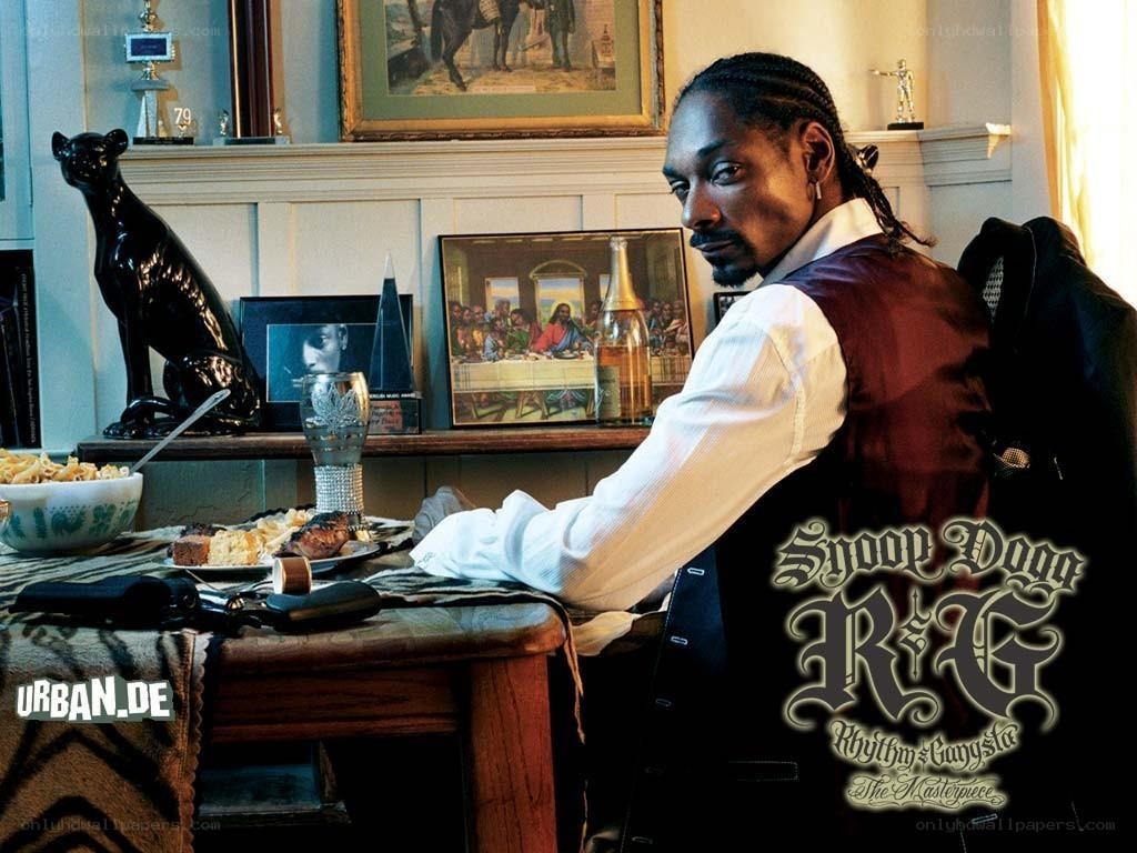 Snoop Dogg at a dining table