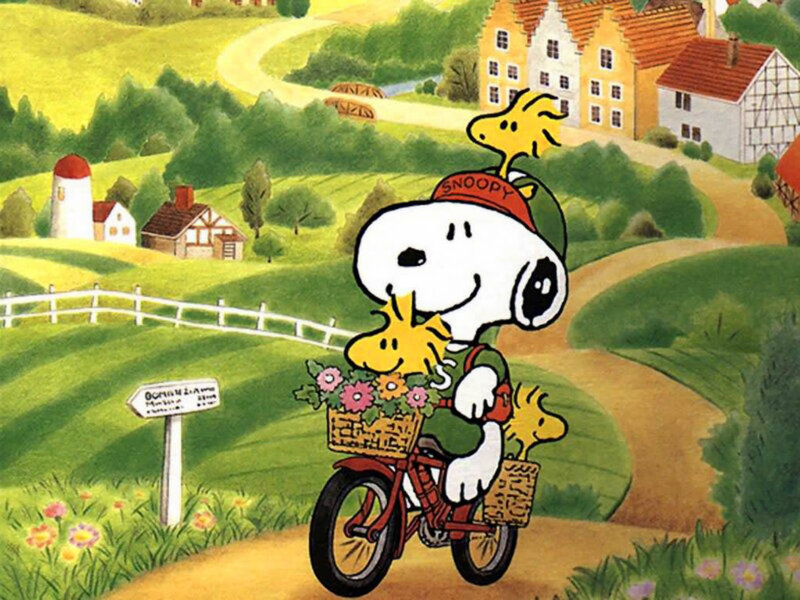 Snoopy on a bike with Woodstock