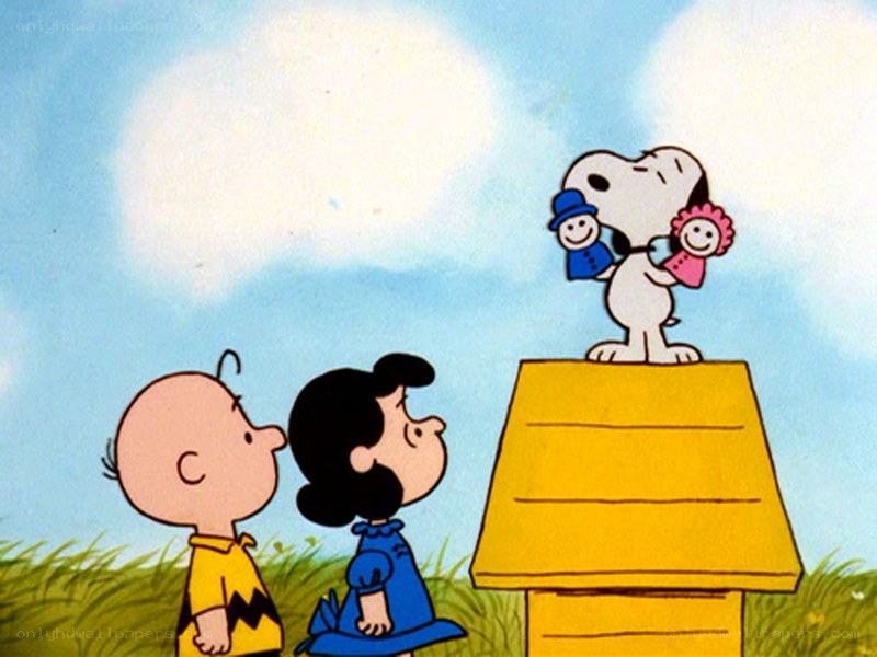 Snoopy on his doghouse