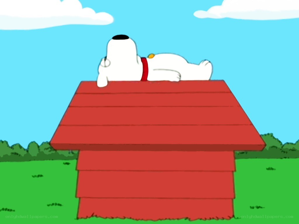 Snoopy resting on doghouse