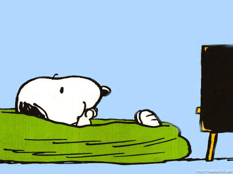 Snoopy sleeping on a blanket