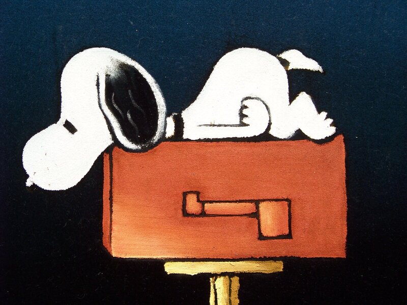Snoopy sleeping on mailbox