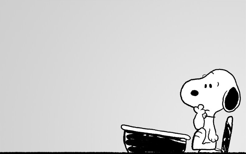 Snoopy thinking at his doghouse