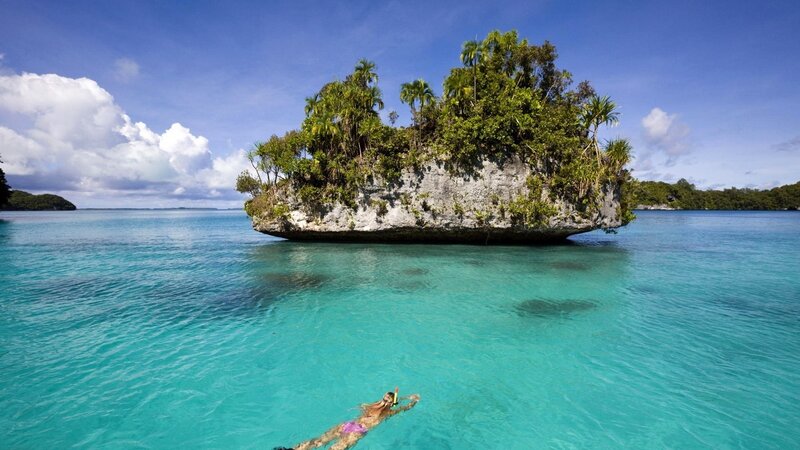 Snorkeler near tropical island