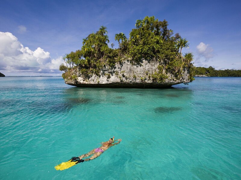 Snorkeler near tropical island