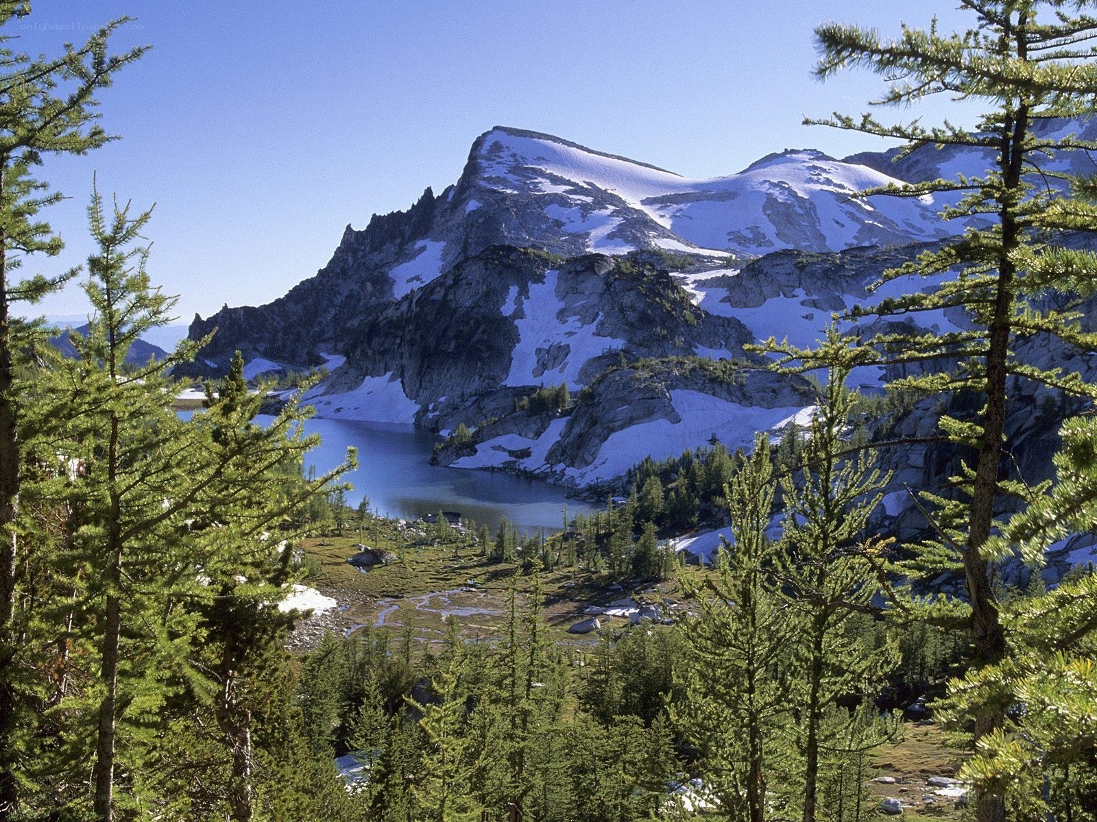 Snow-capped mountain and alpine lake