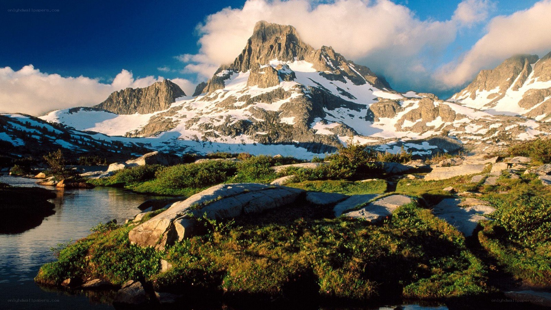 Snow-capped mountain and alpine lake