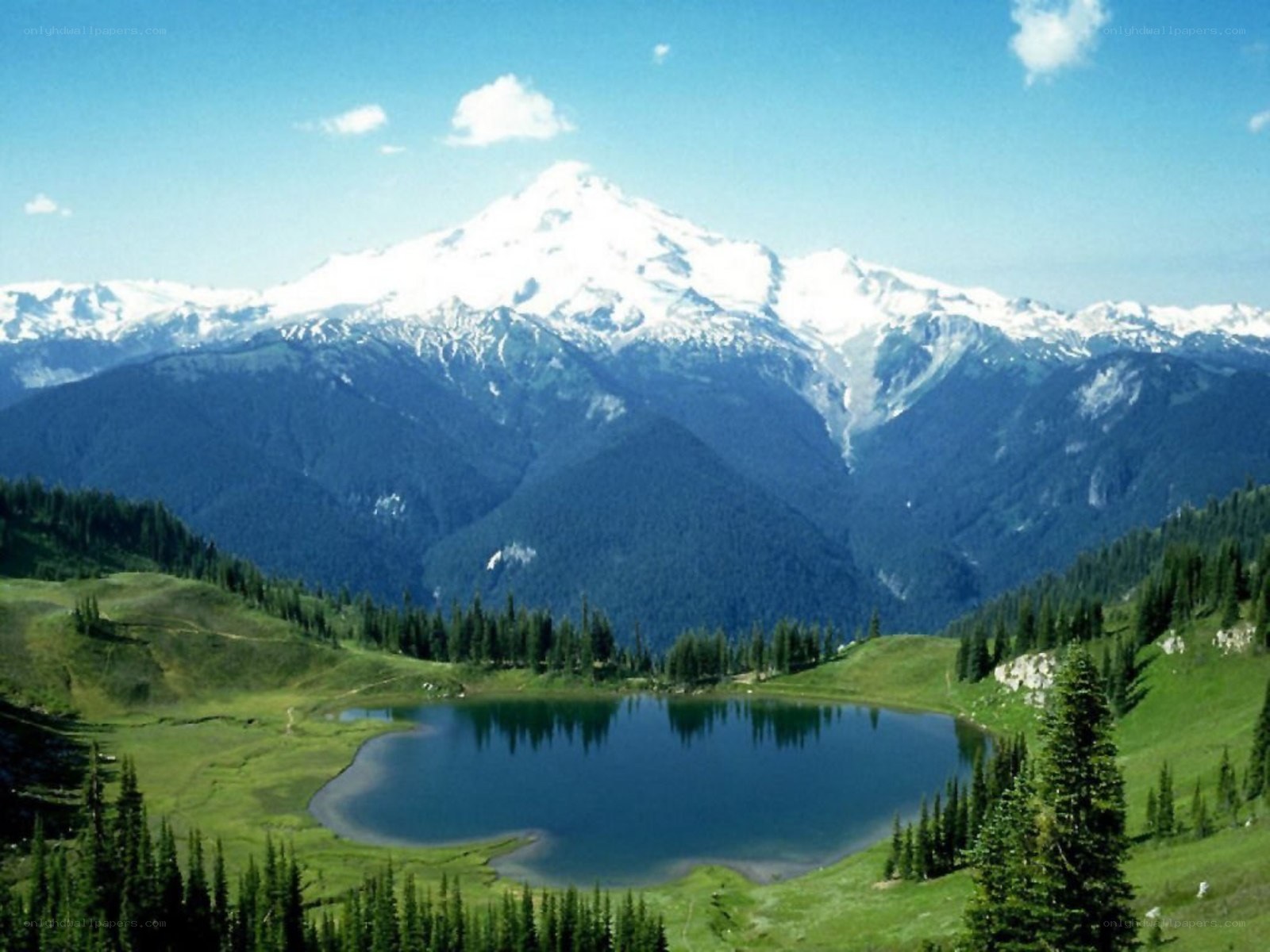 Snow-capped mountain and alpine lake