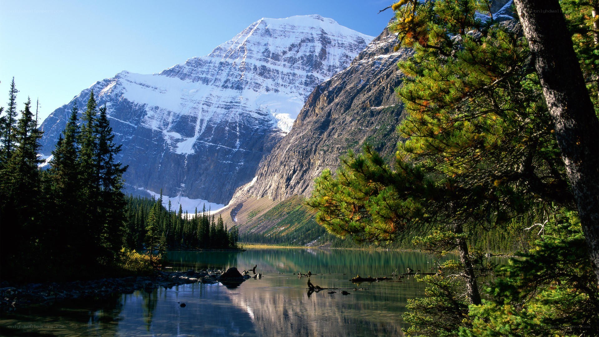 Snow-capped mountain and lake