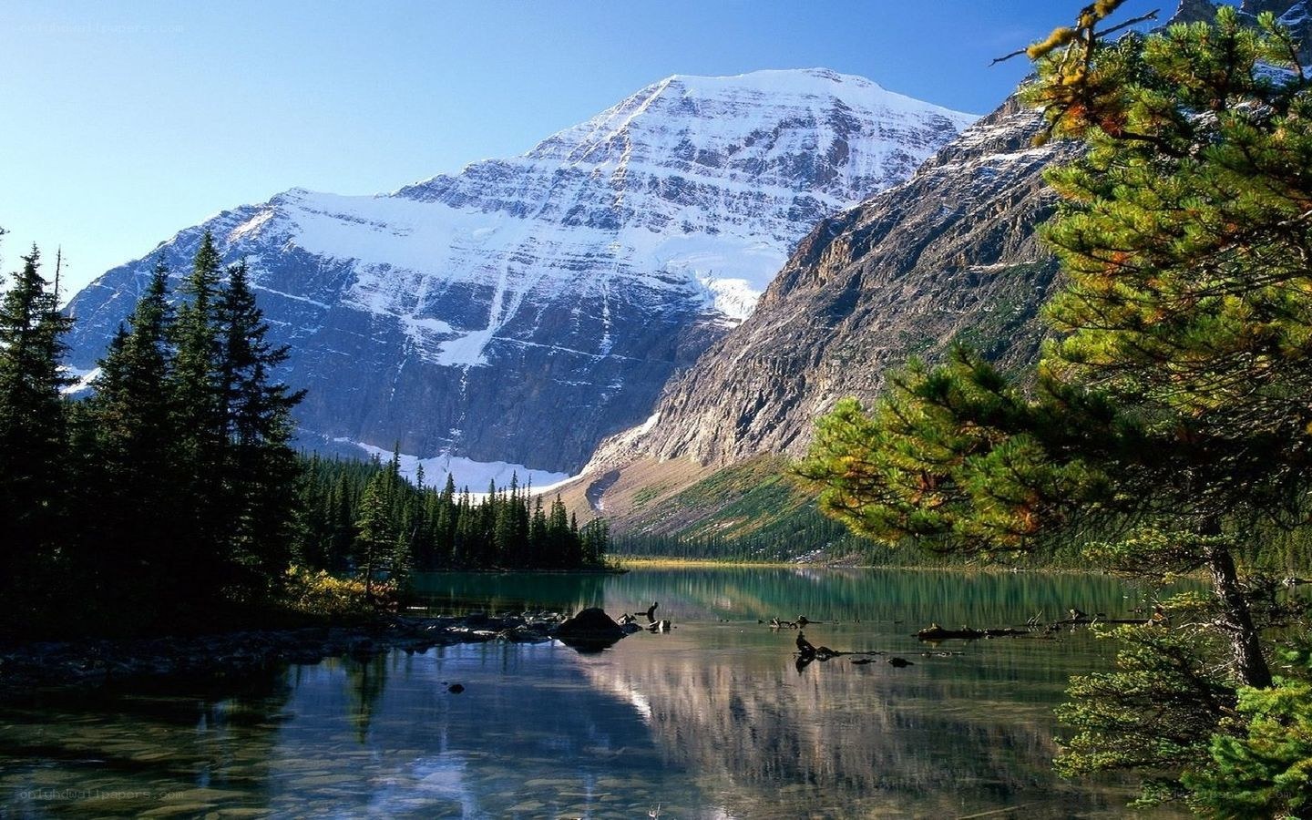 Snow-capped mountain and lake