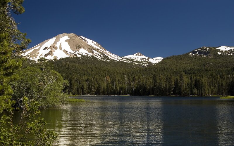 Snow-capped mountain and lake