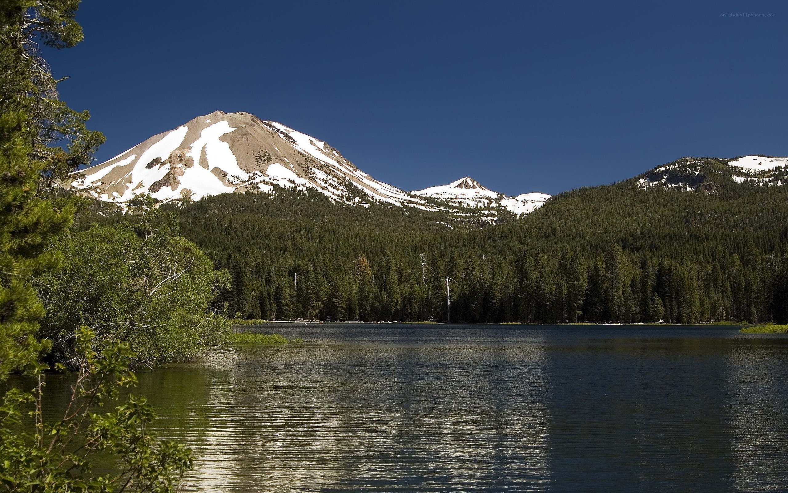 Snow-capped mountain and lake