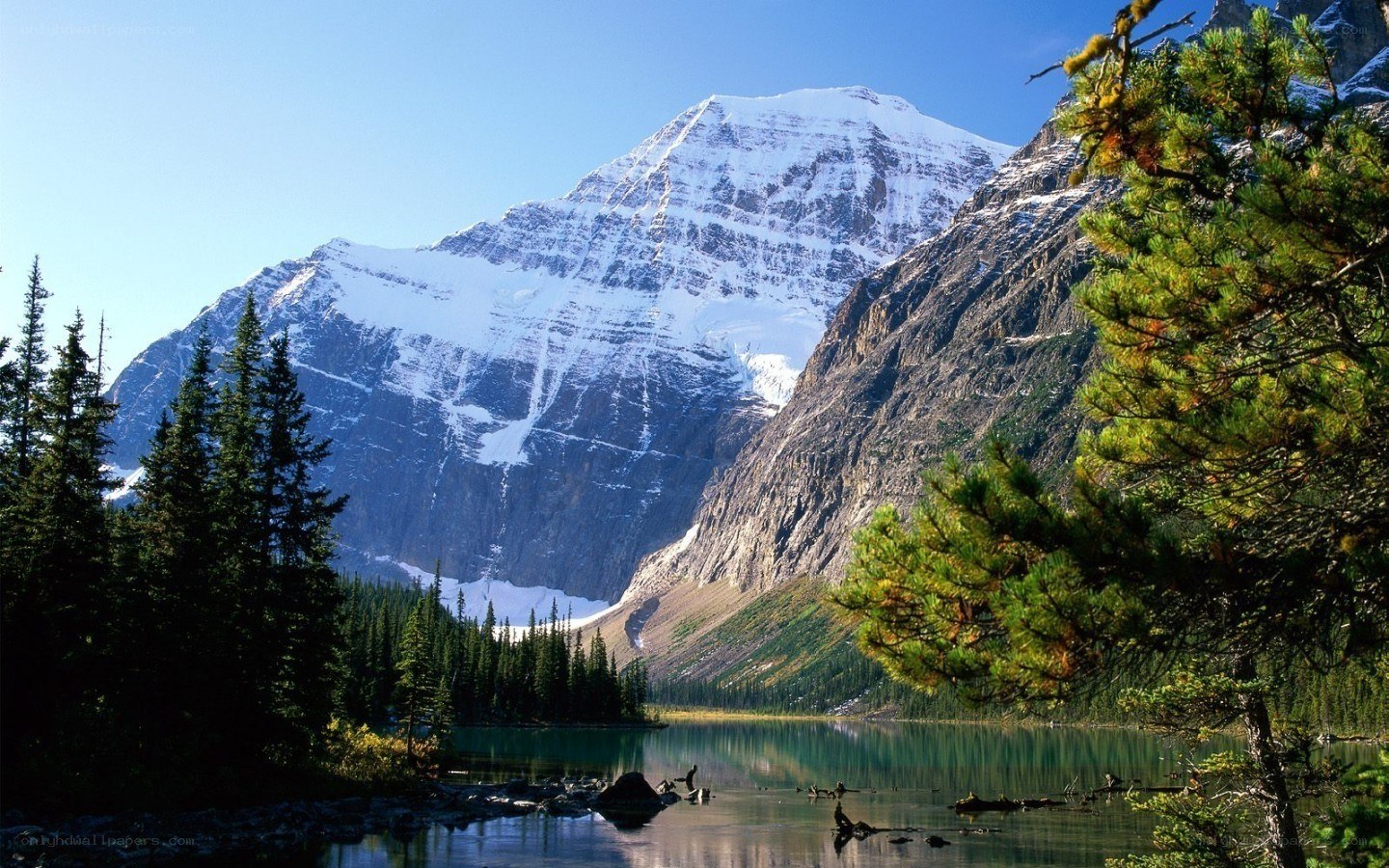 Snow-capped mountain and lake