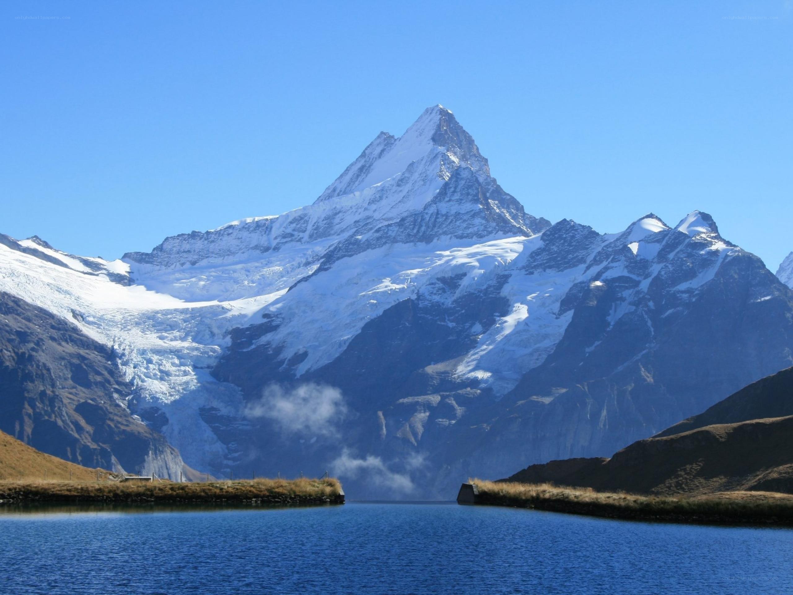 Snow-capped mountain and lake