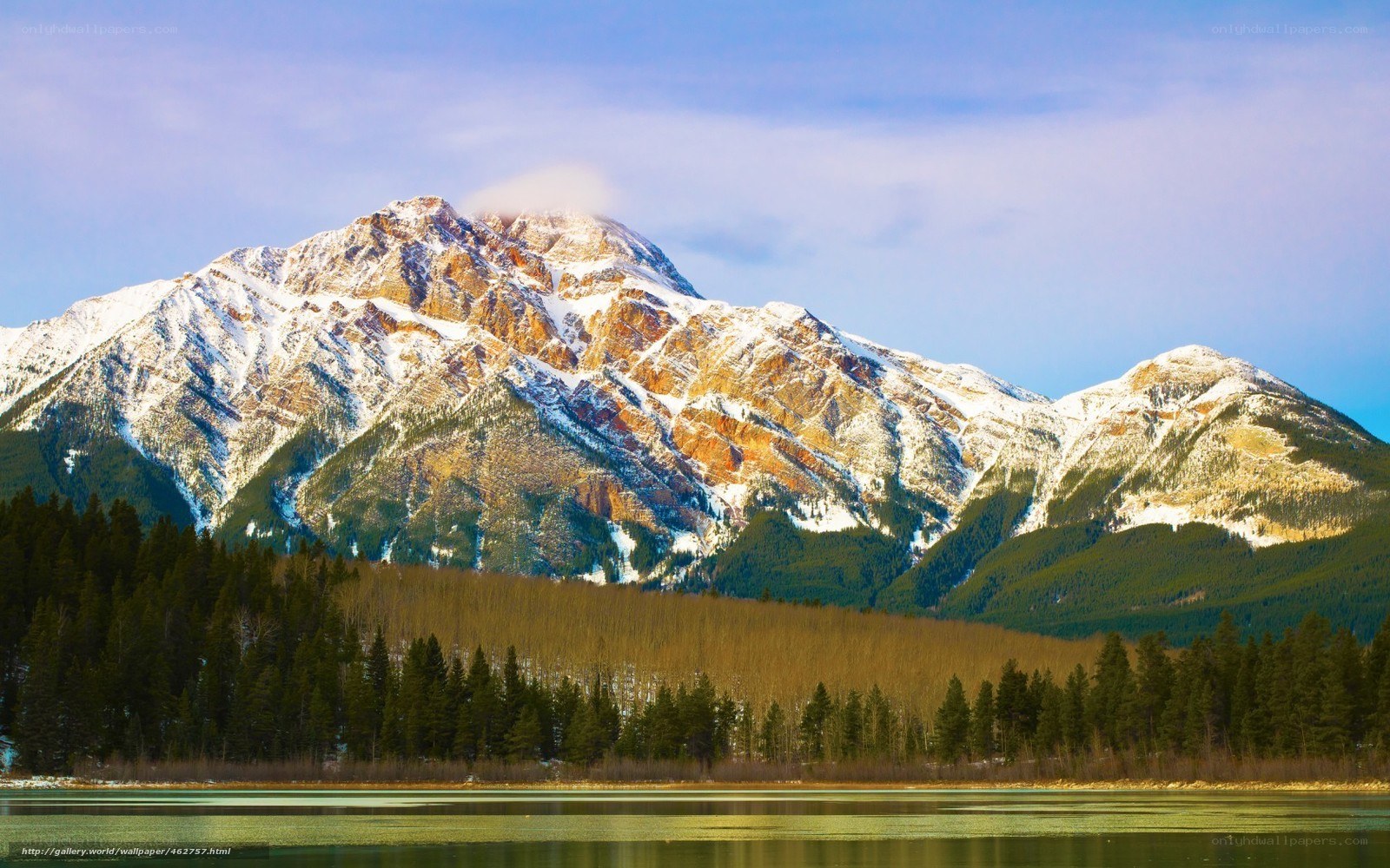 Snow-capped mountain and lake