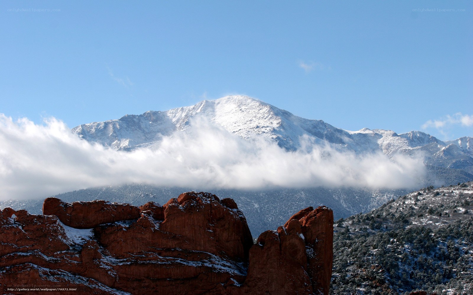 Snow-Capped Mountain and Red Rocks