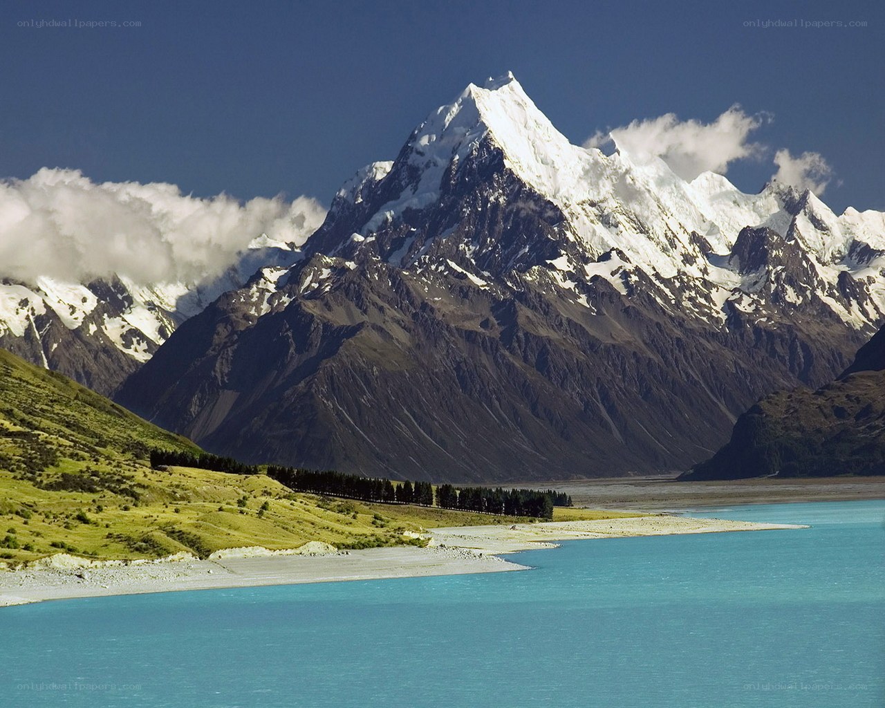 Snow-capped mountain and turquoise lake