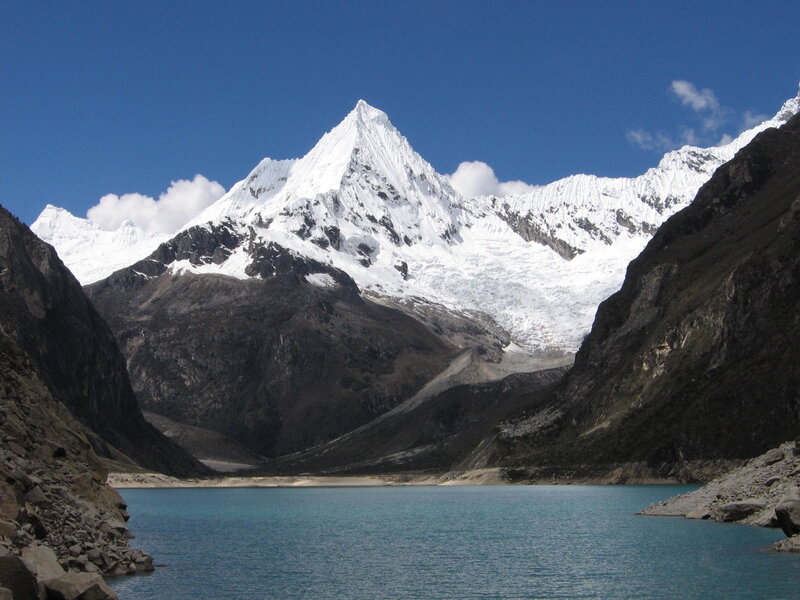 snow-capped mountain and turquoise lake