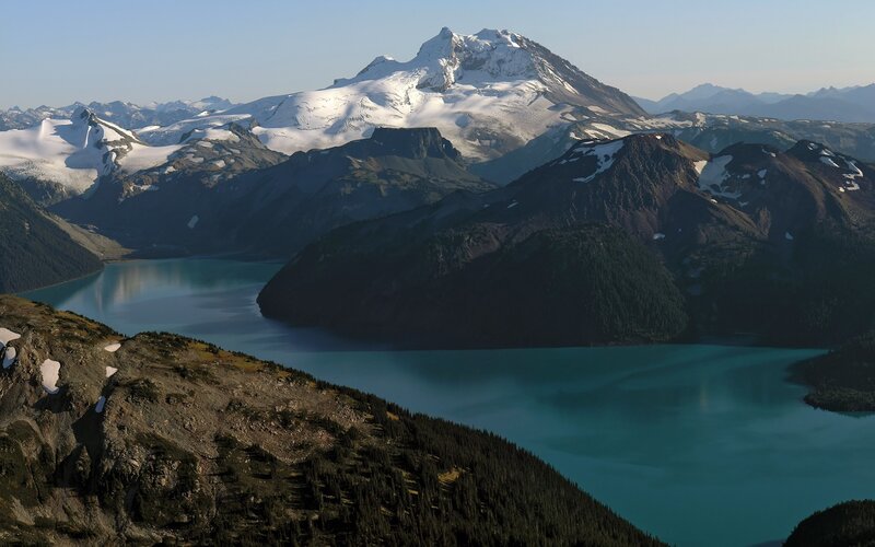 Snow-capped mountain and turquoise lake