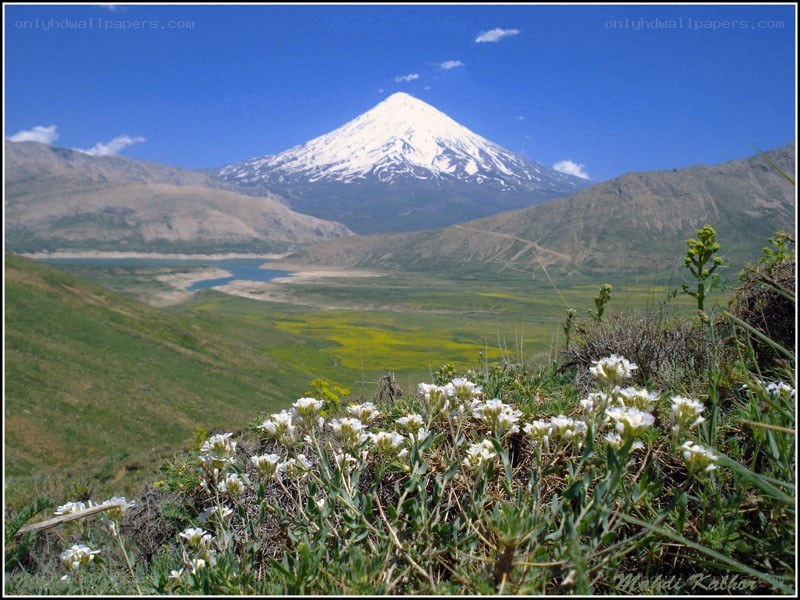 Snow-capped mountain and valley