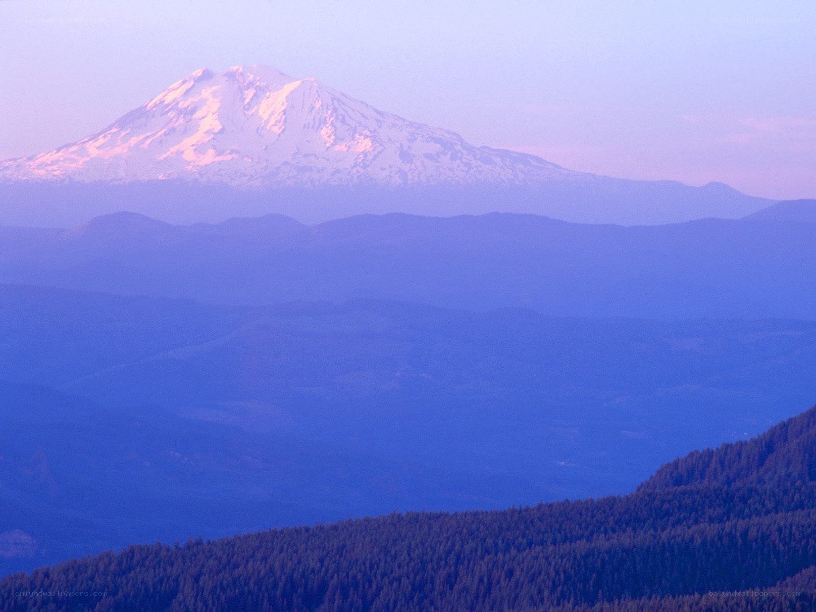 Snow-capped mountain at dawn