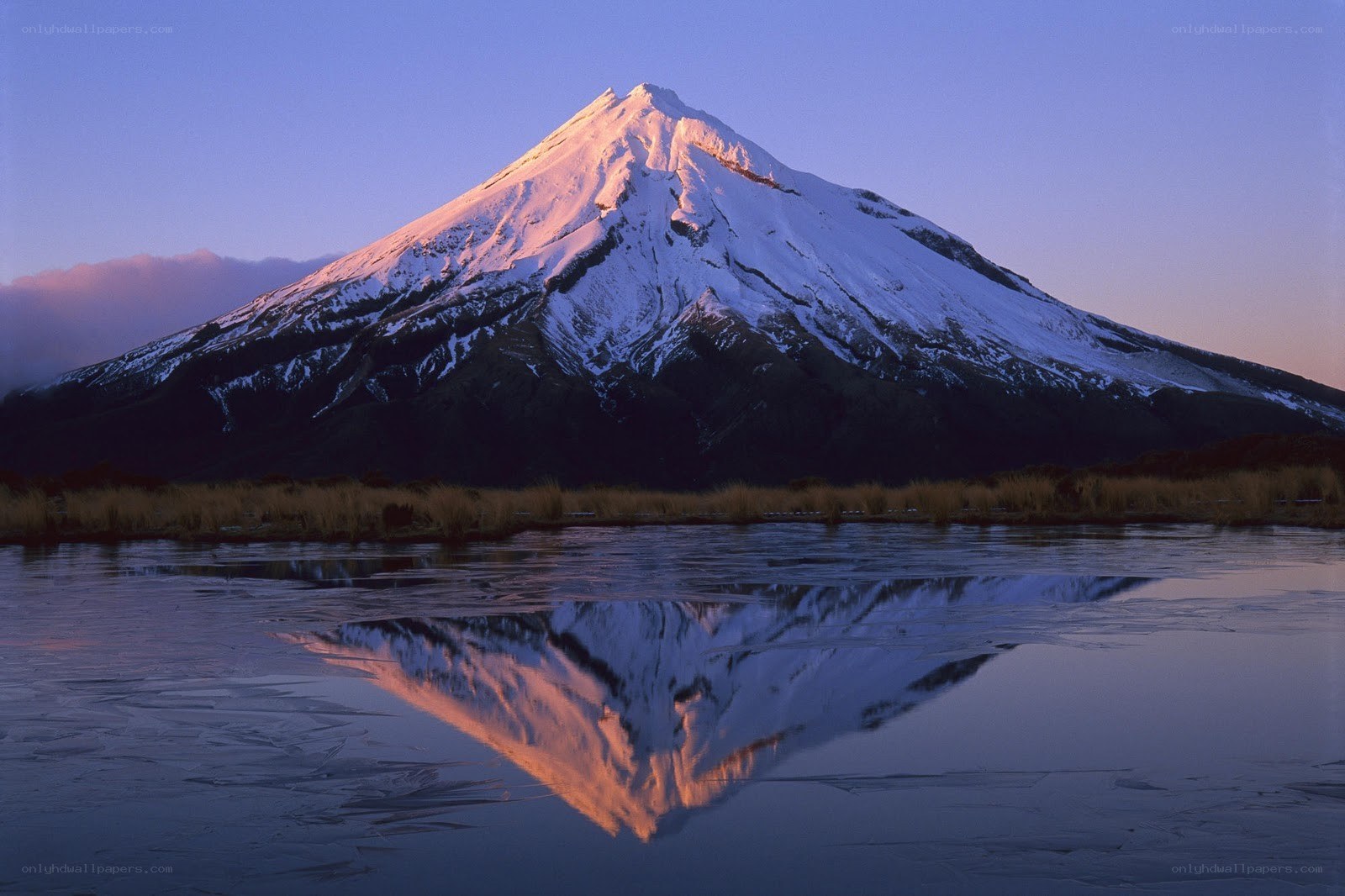 Snow-capped mountain at dawn