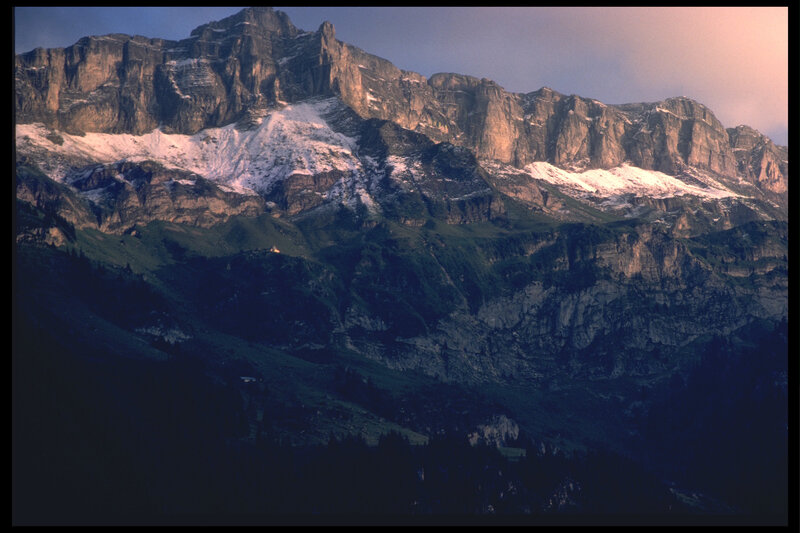 Snow-capped mountain at dusk