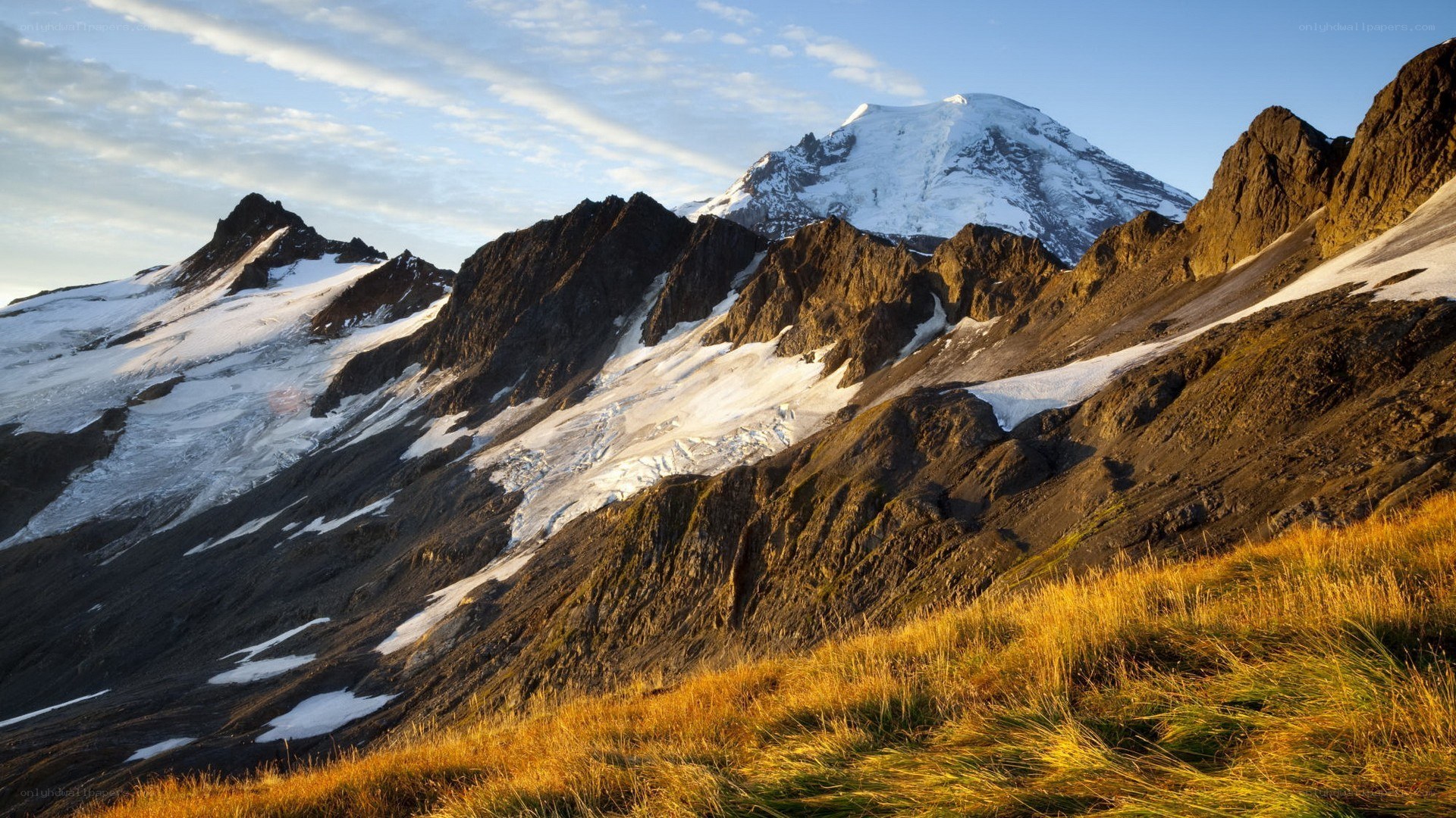 Snow-capped mountain at sunrise