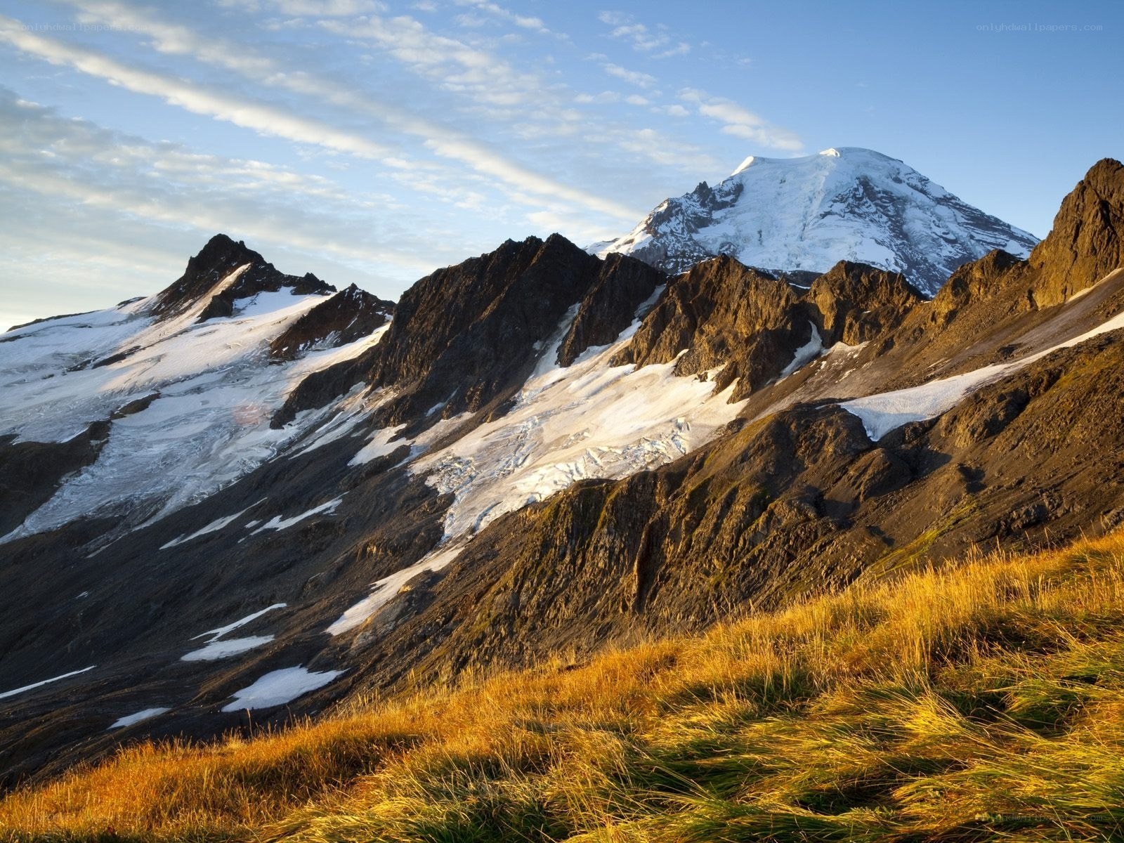 Snow-capped mountain at sunrise