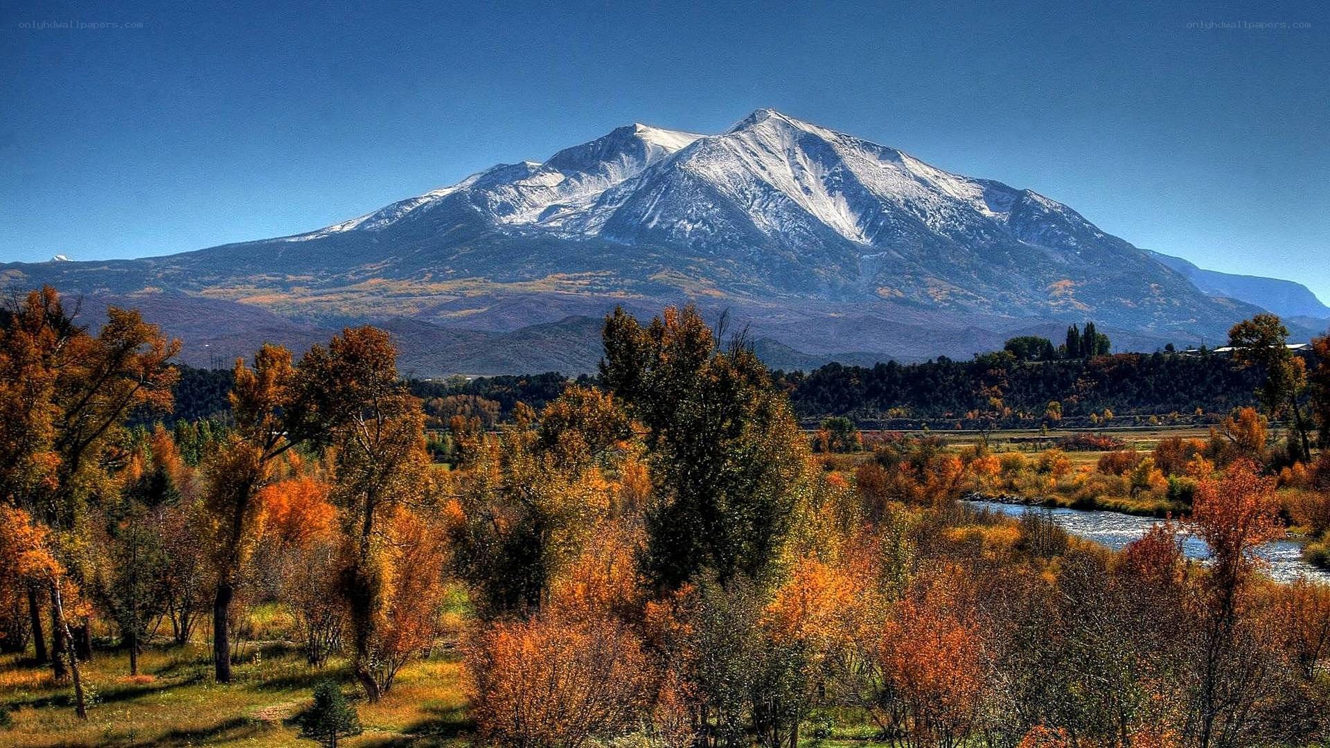 Snow-capped mountain in autumn