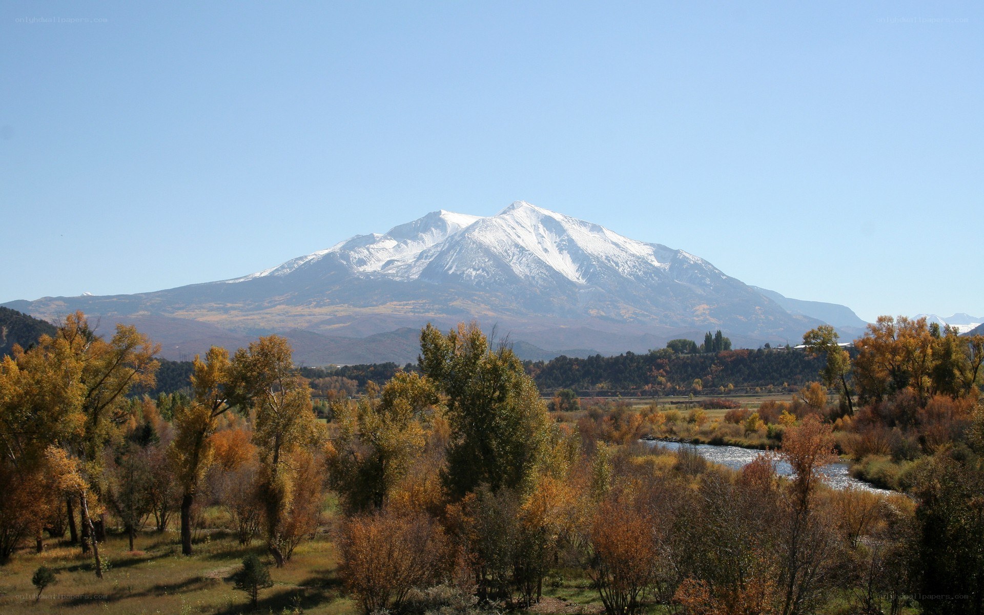 Snow-capped mountain in autumn