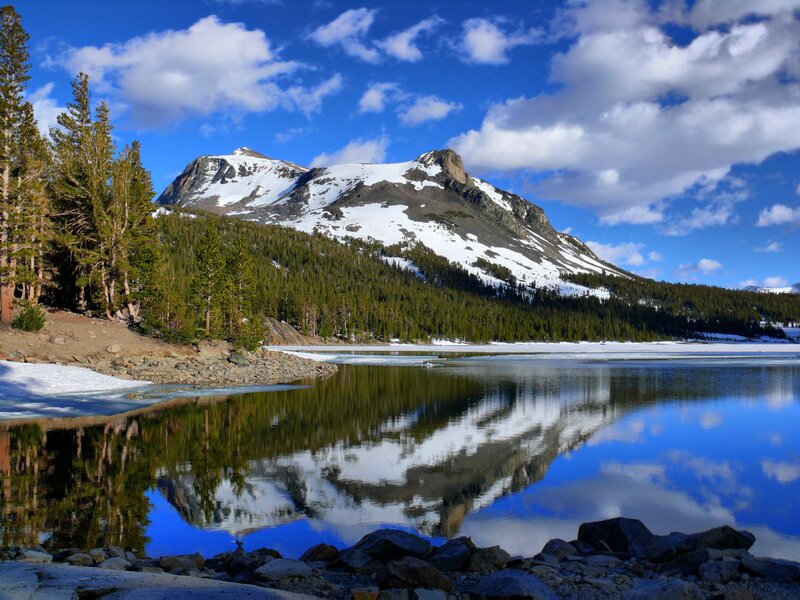 Snow-capped Mountain Lake — Blue, Serene, Afternoon, Photograph, Trees, Sky