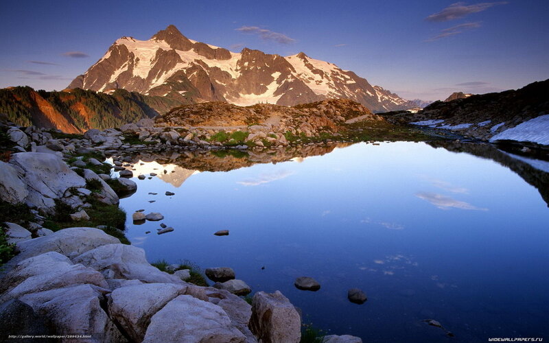 Snow-capped Mountain Lake — Blue, Serene, Sunrise, Photograph, Rocks