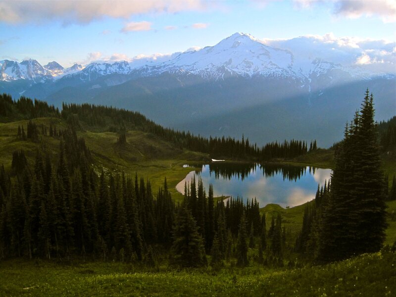 Snow-capped Mountain Lake — Green, Serene, Morning