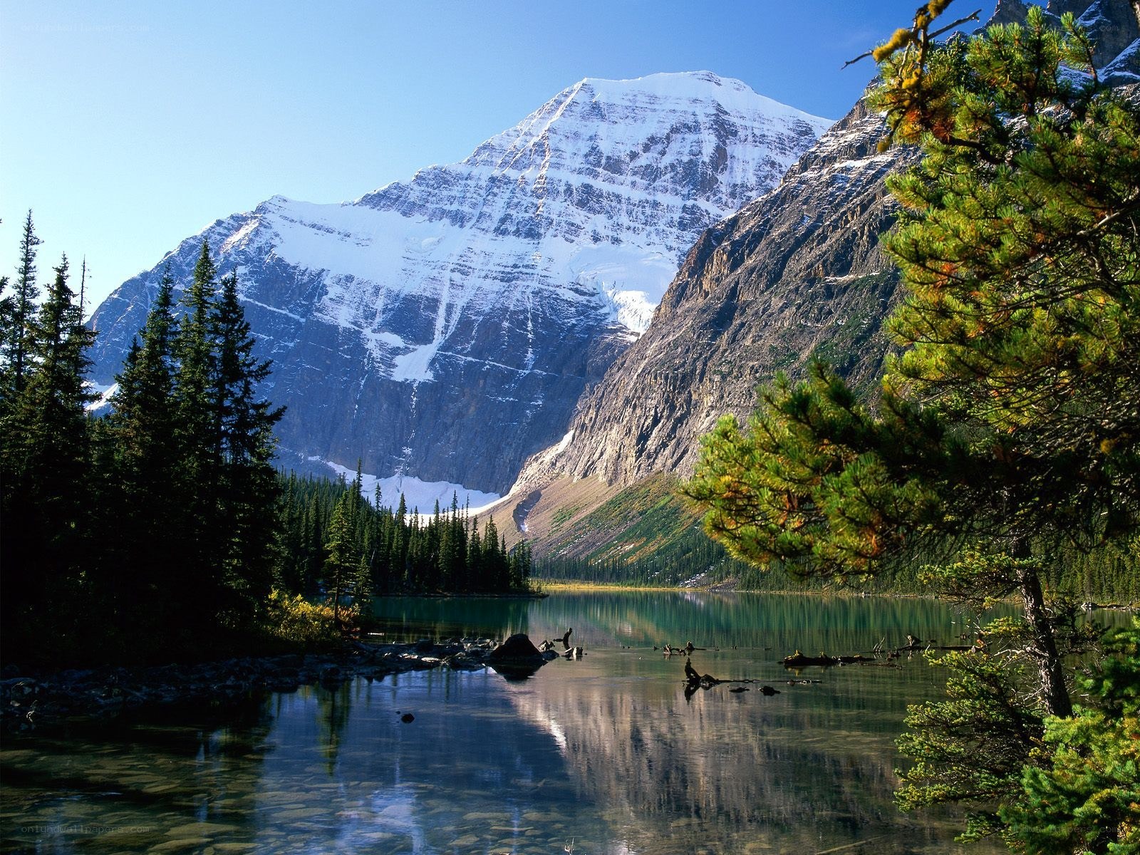 Snow-capped mountain lake landscape
