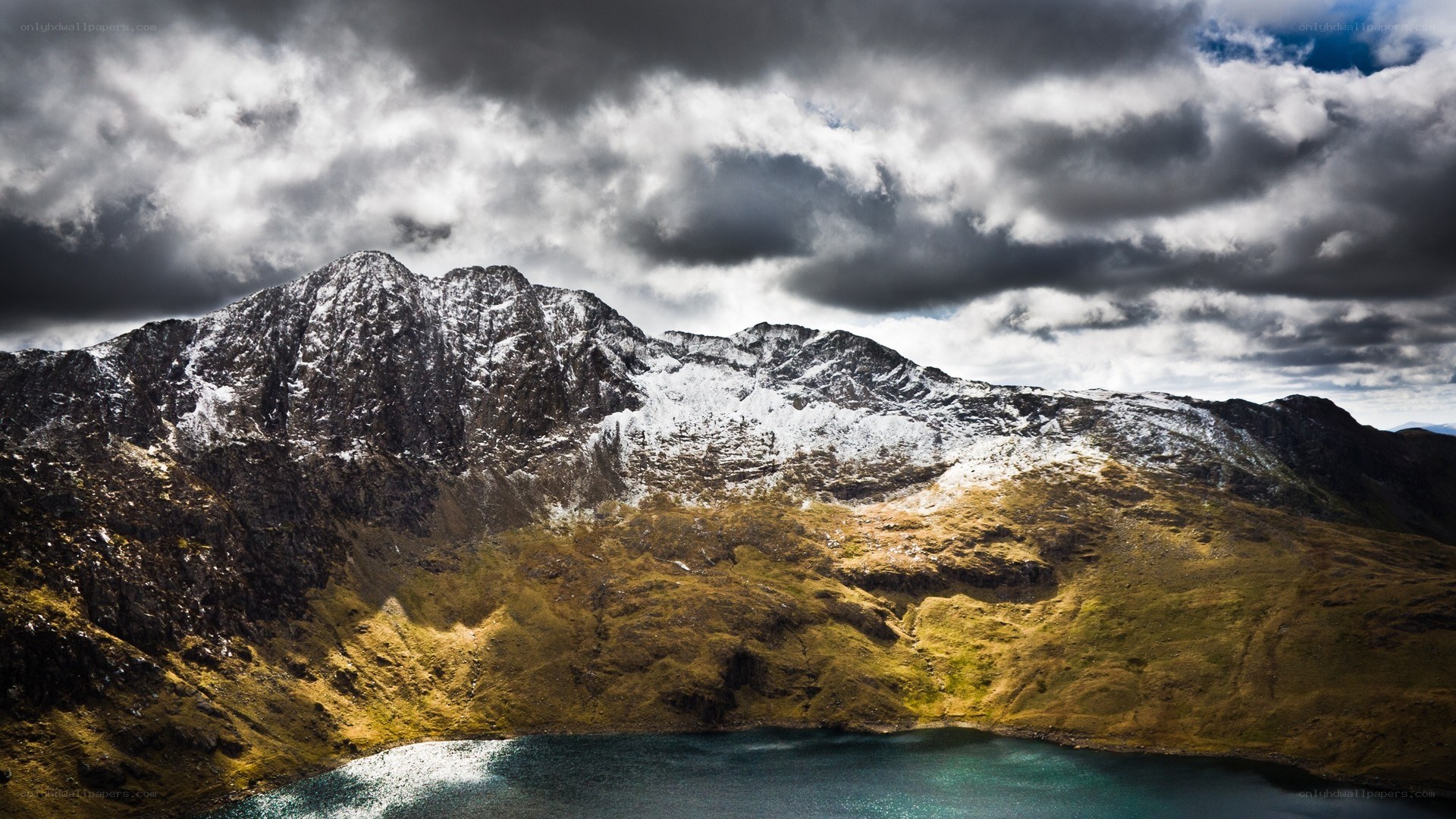 Snow-capped mountain lake landscape