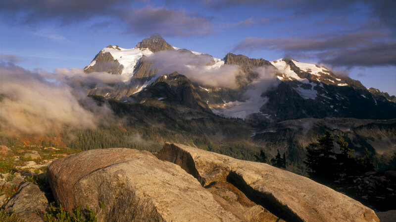 Snow-capped mountain peak at sunrise