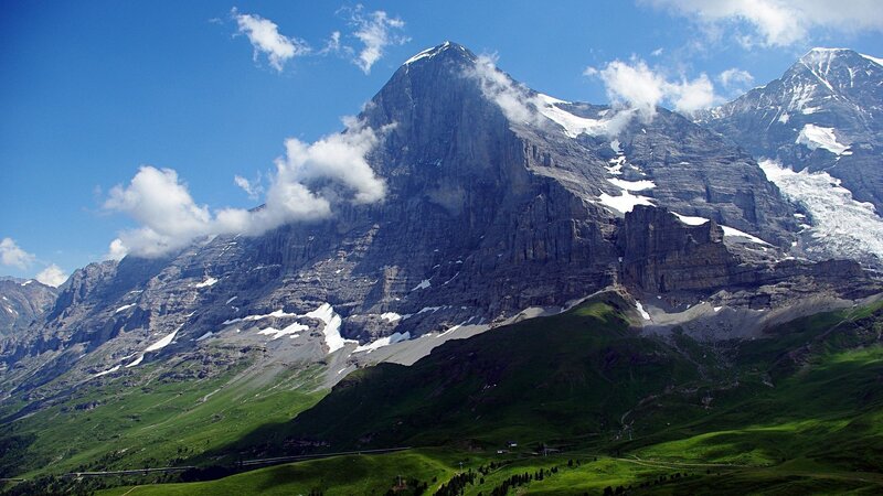 Snow-capped Mountain Peak — Blue, Dramatic, Afternoon, Photograph, Clouds, Green Hills, Glacier