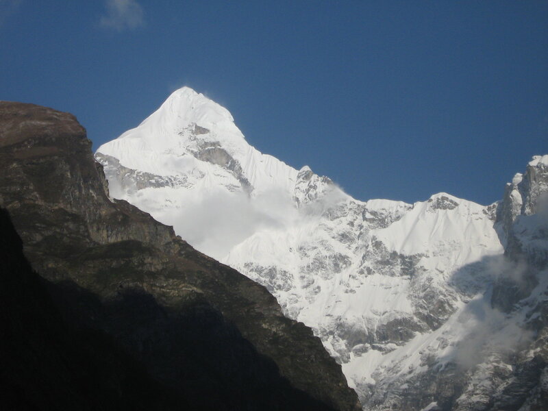 Snow-capped Mountain Peak — Blue, Dramatic, Afternoon, Photograph, Clouds, Sky, White, Brown