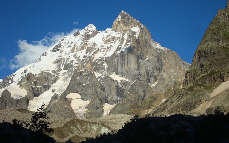 Snow-capped Mountain Peak — Blue, Dramatic, Afternoon, Photograph, Rocky Slopes