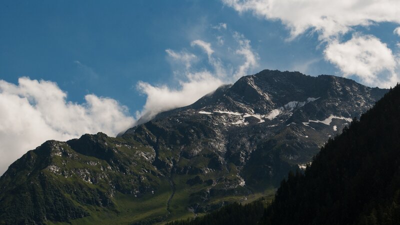 Snow-capped Mountain Peak — Blue, Serene, Afternoon, Photograph, Clouds, Trees