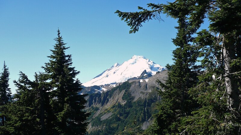 Snow-capped Mountain Peak — Blue, Serene, Daytime