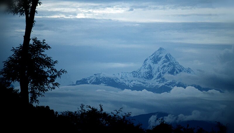 Snow-capped Mountain Peak — Blue, Serene, Morning, Photograph, Clouds, Tree Silhouette