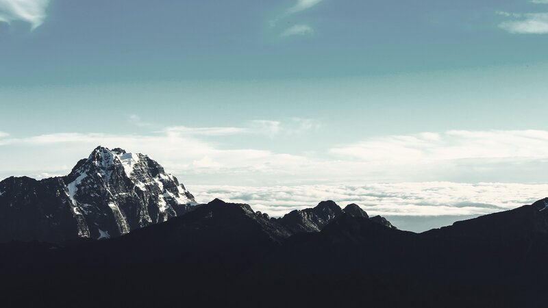 Snow-capped Mountain Peak — Blue, Serene, Photograph, Mountains