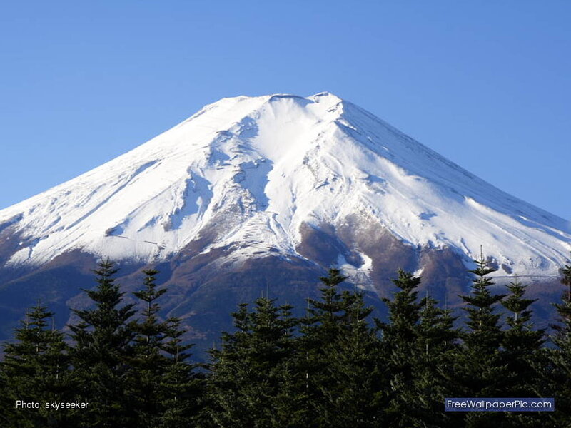 Snow-capped Mountain Peak — Blue, Serene, Winter