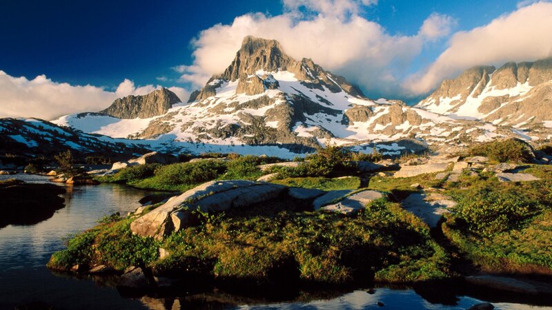 Snow-capped Mountain Peak — Clouds