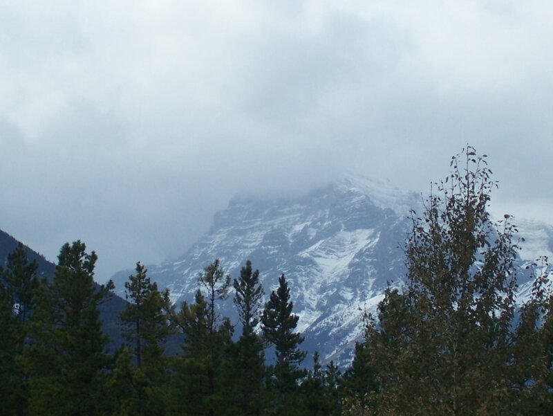 Snow-capped Mountain Peak — Gray, Overcast