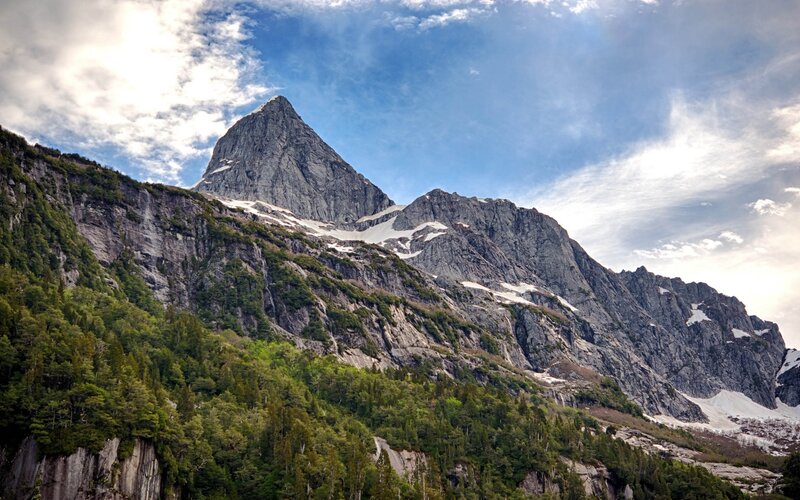 Snow-capped Mountain Peak — Green, Dramatic, Afternoon, Photograph